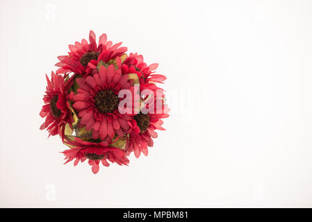 Reusable artificial flowers made from cloth and plastic. Stock Photo
