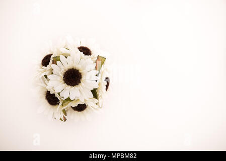 Reusable artificial flowers made from cloth and plastic. Stock Photo