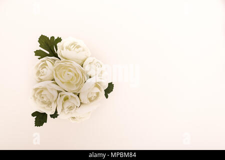 Reusable artificial flowers made from cloth and plastic. Stock Photo