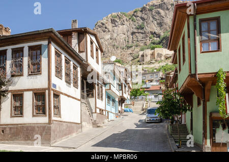 Beautiful old street in downtown with houses with wooden shutters in the classic Turkish Ottoman style, Turkey, center of Afyonkarahisar The two-story Stock Photo