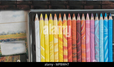 A Box of Multicolored Pencils Stock Photo