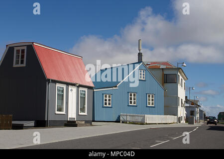 Quaint old colourful village houses in Eyrarbakki, Iceland. 21st May, 2018. South Iceland Weather. The spring sunshine highlights the old village houses.  Credit; ConradElias/AlamyLiveNews. Stock Photo