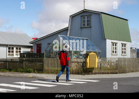 Quaint old colourful village houses in Eyrarbakki, Iceland. 21st May, 2018. South Iceland Weather. The spring sunshine highlights the old village houses.  Credit; ConradElias/AlamyLiveNews. Stock Photo