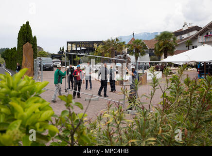 22 May 2018, Italy, Eppan: Workers set up fences outside the team hotel 'Weinegg'. The German soccer national team will prepare for the World Cup 2018 in Russia at their training camp near Bozen from 23 May to 07 June 2018. Photo: Christian Charisius/dpa Stock Photo