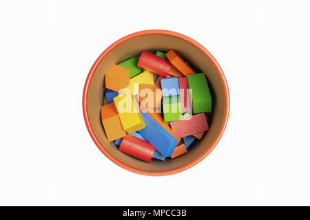Colorful wooded toy blocks in bucket isolated on white background. Top view. Stock Photo