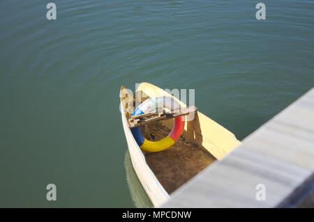 Colored lifebelt isolated on the boat (Black Dragon Pool, Lijiang, Yunnan, China) Stock Photo