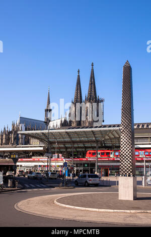 the 'Obelisk of Tutankhamun' by the American artist  Rita McBride on the Breslauer square, main station, cathedral, Cologne, Germany  der „Obelisk of  Stock Photo
