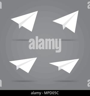 Paper plane set with shadow on gray background. Collection of white origami airplane flight and leave shadow Stock Vector