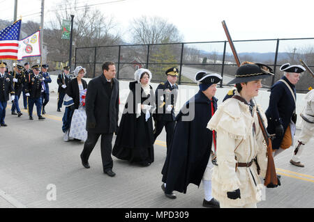 Brigadier General Stephen E. Strand, deputy commanding general for the 88th Regional Support Command, walks with President William Henry Harrison's wife Anna Symmes Harrison (played by Susan Bell, a direct descendent of Anna), toward the Harrison Tomb in North Bend, Ohio, Feb. 3, during the ceremony to honor the ninth President of the United States. Stock Photo
