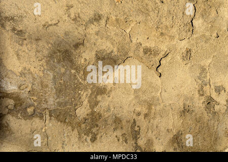 background, texture - old weathered cracked cement plaster on the wall Stock Photo