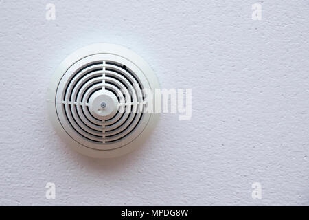 Smoke detector fire alarm on celling Stock Photo