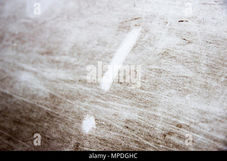 exclamation point is drawn on scratched dirty background Stock Photo