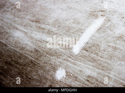 exclamation point is drawn on scratched dirty background Stock Photo