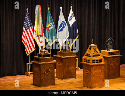 Awards and trophies are displayed during the Best Ranger Competition 2017 Award Ceremony at Marshall Auditorium on Fort Benning, Ga., April 10, 2017. The 34th annual David E. Grange Jr. Best Ranger Competition 2017 is a three-day event consisting of challenges to test competitor's physical, mental, and technical capabilities. Stock Photo