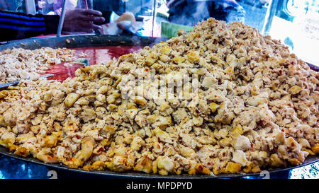 Turkish tavuk kavurma / roasted chicken pieces in pan. fast food Stock Photo