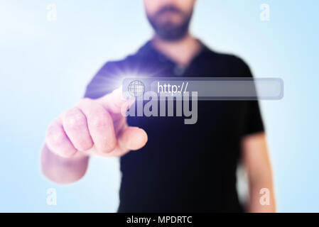 businessman touching browser address bar with globe icon on translucent interface Stock Photo