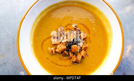 Lentil or Pumpkin Soup with croutons. Traditional food. Stock Photo