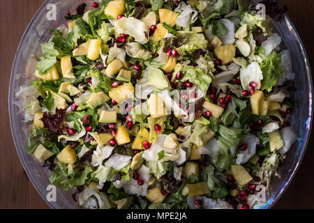 Fresh green organic salad in glass bowl. Stock Photo