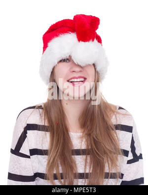 Expressive emotional girl in a Christmas hat on a white background. isolate Stock Photo
