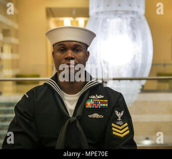 170206-N-VC599-095 VIRGINIA BEACH, Va. (Feb. 6, 2017) Information Systems Technician First Class Bradford Brown, representing Littoral Combat Ship Squadron Two, poses for a portrait during Sailor of the Year (SOY) week. The SOY program was established in 1972 by Chief of Naval Operations Adm. Elmo Zumwalt and Master Chief Petty Officer of the Navy John Whittet to recognize an individual Sailor who best represented the ever-growing group of dedicated professional Sailors at each command and ultimately the Navy. The Naval Surface Force Atlantic Sea and Shore SOY selected at the end of this week  Stock Photo