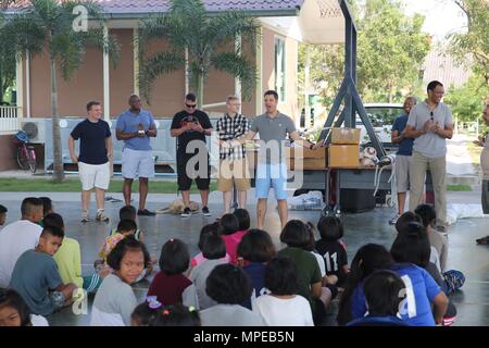 https://l450v.alamy.com/450v/mpeb5n/170205-n-ix266-001-huay-tai-thailandmembers-of-military-sealift-command-far-east-expeditionary-port-unit-113-epu-113-introduces-themselves-to-kids-of-the-protection-and-development-center-cpdc-during-a-cobra-gold-2017-community-outreach-event-feb-5-the-cpdc-is-a-local-orphanage-dedicated-to-the-caring-of-displaced-children-orphans-and-rescued-trafficked-children-epu-113-is-a-reserve-unit-based-out-of-fort-worth-texas-and-conducts-expeditionary-port-operations-in-support-of-operations-and-contingencies-us-navy-photo-by-grady-t-fontanareleased-mpeb5n.jpg