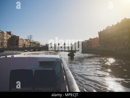 Water excursions along the rivers and canals of St. Petersburg. Gorstkin bridge. Stock Photo