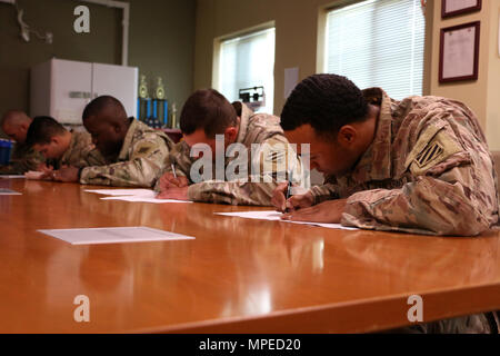 Soldiers of 6th Squadron, 8th Cavalry Regiment, 2nd Infantry Brigade Combat Team, 3rd Infantry Division take a written reconnaissance exam February 8, 2017 at Fort Stewart, Ga. Troopers of 6-8 Cav. participated and hosted a selection to determine who would go on to compete for a spot in this year's biennial Gainey Cup competition. (U.S. Army photo by Sgt. Robert Harris/Released)