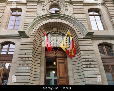 Geneva, Switzerland - August 30, 2016: Palace of Justice building with flags, Geneva old town, Switzerland Stock Photo