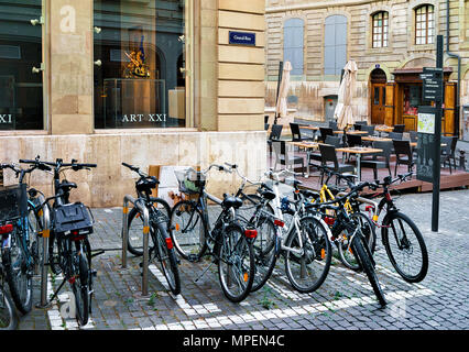 Geneva, Switzerland - August 30, 2016: Bicycles at the Street in the city center of Geneva, Switzerland. Stock Photo