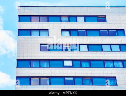 Vilnius, Lithuania - May 19, 2017: Windows as the details of the modern residential building architecture. Toned Stock Photo