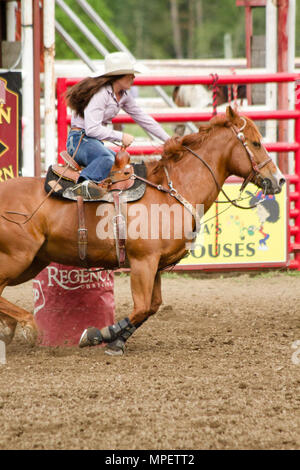 Ladies barrel racing Stock Photo - Alamy