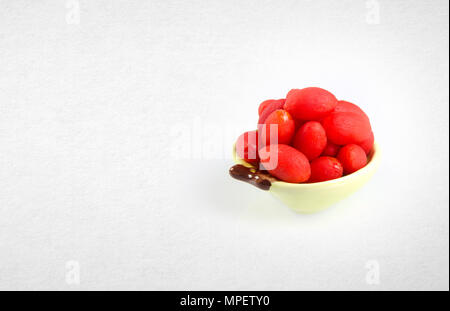 Dried preserved red canarium album on a background Stock Photo