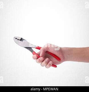 Pliers or Pliers in hand on the background Stock Photo