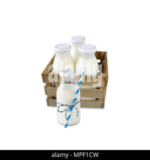 milk bottles in a box isolated on white background Stock Photo