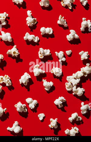 Popcorn on red background, pop contemporary style Stock Photo