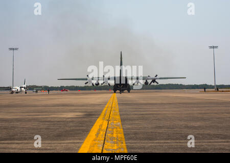 A Japanese Self-Defense Force C-130 aircraft taxis the runway  during a non-combatant evacuation operation exercise during  Cobra Gold 2017 at Utapao International Airport in Rayong  Province, Thailand, Feb. 19, 2017. Cobra Gold, in its 36th  iteration, focuses on humanitarian civic action, community  engagement, and medical activities to support the needs and  humanitarian interest of civilian populations around the region.  (U.S. Marine Corps photo by Lance Cpl. Daniel R. Betancourt  Jr.) Stock Photo
