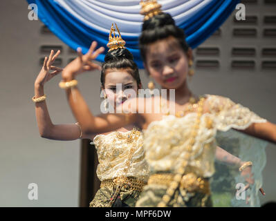 RAYONG PROVINCE, Thailand (Feb. 21, 2017) – Ban Nong Muang school students perform an ethnic Thai dance during a dedication ceremony, marking the completion of the Ban Nong Muang school expansion project. The project was a joint effort by the U.S. Naval Mobile Construction Battalion 5, Construction and Developmental Regiment, Sattahip Naval Base and Korean Naval Mobile Construction Battalion 2nd Engineer, part of Cobra Gold 2017. Cobra Gold, in its 36th iteration, is the largest Theater Security Cooperation exercise in the Indo-Asia-Pacific. This year’s focus is to advance regional security an Stock Photo
