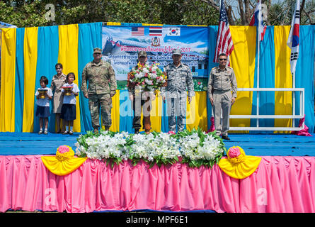RAYONG PROVINCE, Thailand (Feb. 21, 2017) – (From left to right) Brig. Gen. Bryan Suntheimer, United States Army Pacific Deputy Commanding General for Army National Guard, Rear Adm. Jong Sam Kim, commander, Republic of Korea Navy Component 5, Vice Adm. Panya Lekbua, deputy commander-in-chief, Royal Thai Fleet and Gov. Surasak Charoensirichot, Rayong provincial governor stand on stage during a dedication ceremony, marking the completion of the Ban Nong Muang school expansion project. The project was a joint effort by the U.S. Naval Mobile Construction Battalion 5, Construction and Developmental Stock Photo