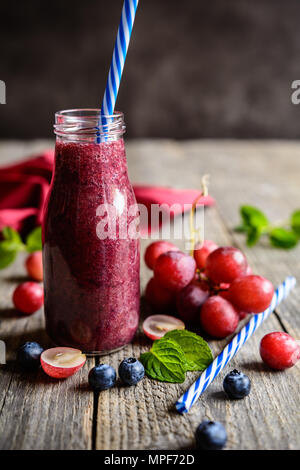 Download Blueberry Smoothie In A Glass Bottle Stock Photo Alamy PSD Mockup Templates