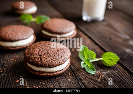 Traditional chocolate Whoopie pies filled with vanilla butter cream Stock Photo