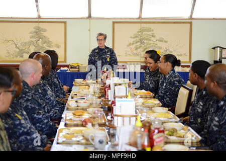 170222-N-LD174-028 YOKOSUKA, Japan (Feb. 22, 2017) U.S. Pacific Fleet Master Chief Susan Whitman talks with Sailors during lunch at the Jewel of the East General Mess onboard Fleet Activities Yokosuka. Whitman listened to Sailor’s concerns and discussed items that affect ship and Sailor readiness and visited multiple shore and sea commands to ensure maximum readiness of shipboard and shore Sailors throughout the fleet. (U.S. Navy photo by Mass Communication Specialist 1st Class Juan King/Released) Stock Photo