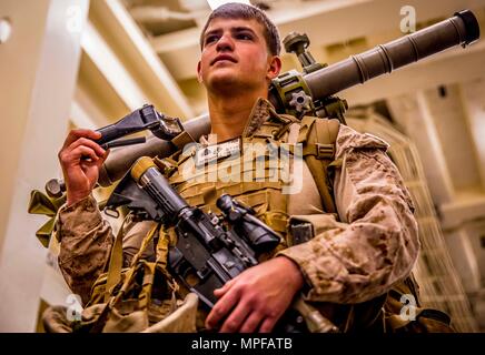 Marines from Gulf Company, 2/5, attack an enemy machine gun position on ...