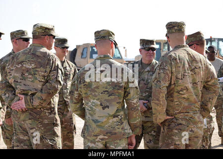 Kentucky's Director of the Joint Staff Brig. Gen. Benjamin Adams III greets Soldiers from the 207th Horizontal Construction Company Mar. 4 during a visit to Camp Arifjan, Kuwait. Stock Photo