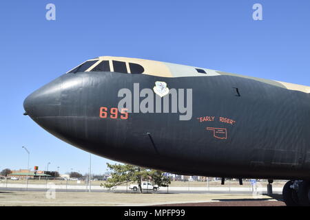 The nose and forward fuselage of a Boeing B-52D Stratofortress in black and Southeast Asia paint scheme and Strategic Air Command markings in the Charles B. Hall Memorial Air Park on Feb. 16, 2017, Tinker Air Force Base, Oklahoma. B-52 and other types of bombers have been maintained and overhauled at Tinker over the years and the base still maintains B-52H aircraft as part of its primary mission. (U.S. Air Force photo/Greg L. Davis) Stock Photo
