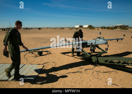 U.S. Marines with Marine Unmanned Aerial Vehicle Squadron 1 (VMU-1) make the final preparations for the last launching of the RQ-7B 'Shadow' March 9, 2017 at Cannon Air Defense Complex at Marine Corps Air Station Yuma, Ariz. VMU-1 will be replacing the RQ-7B 'Shadow' with the RQ-21 'Blackjack,' a more capable drone that uses less launch space than its predecessor. (U.S. Marine Corps photo by Lance Cpl. Isaac Martinez/Released) Stock Photo