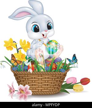 Cartoon little rabbit painting an Easter egg Stock Vector