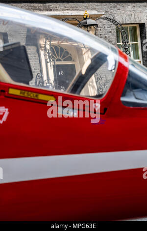 London, UK. 23rd May, 2018. 10 Downing Street door through the cockpit of A Hawker Siddeley Hawk - Red Arrow aircraft in Downing Street for the anniversary of the founding of the RAF, Credit Ian Davidson/Alamy Live News Stock Photo
