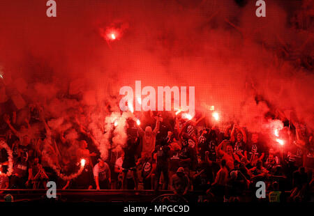 Budapest, Hungary. 23rd May, 2018. Ultra fans of Ujpest FC light torches and make smoke during the Hungarian Cup Final match between Puskas Akademia FC and Ujpest FC at Groupama Arena on May 23, 2018 in Budapest, Hungary. Credit: Laszlo Szirtesi/Alamy Live News Stock Photo