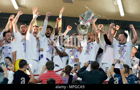 Budapest, Hungary. 23rd May, 2018. Robert Litauszki of Ujpest FC lifts up the cup among teammates during the Hungarian Cup Final match between Puskas Akademia FC and Ujpest FC at Groupama Arena on May 23, 2018 in Budapest, Hungary. Credit: Laszlo Szirtesi/Alamy Live News Stock Photo