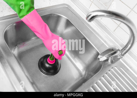 Rubber pump for cleaning the sink. Stock Photo